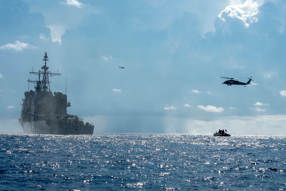 USS Antietam (CG 54), Special Boat Team 12 and EOD Mobile Unit 5 conduct a VBSS training exercise