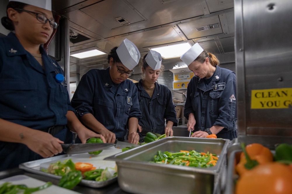 USS MOMSEN Sailors Conduct Meal Preparation