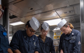 USS MOMSEN Sailors Conduct Meal Preparation