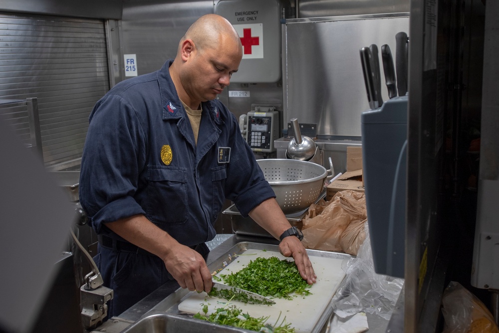 USS MOMSEN Sailors Conduct Meal Preparation