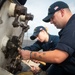 U.S. Sailors conduct maintenance