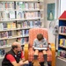 Dog visits Wiesbaden Library for PaWs read-aloud program