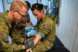 Coalition medics collect and transfuse blood during combined training