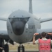Airman marshals KC-135 on the 121ARW flight line