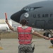Airman marshals KC-135 on the 121ARW flight line