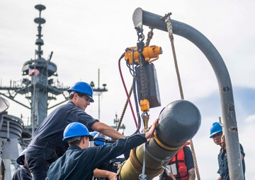 Sailors Aboard USS Milius (DDG 69) Load Mark 46 Torpedos into Mark 32 Surface Vessel Torpedo Tubes