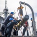 Sailors Aboard USS Milius (DDG 69) Load Mark 46 Torpedos into Mark 32 Surface Vessel Torpedo Tubes