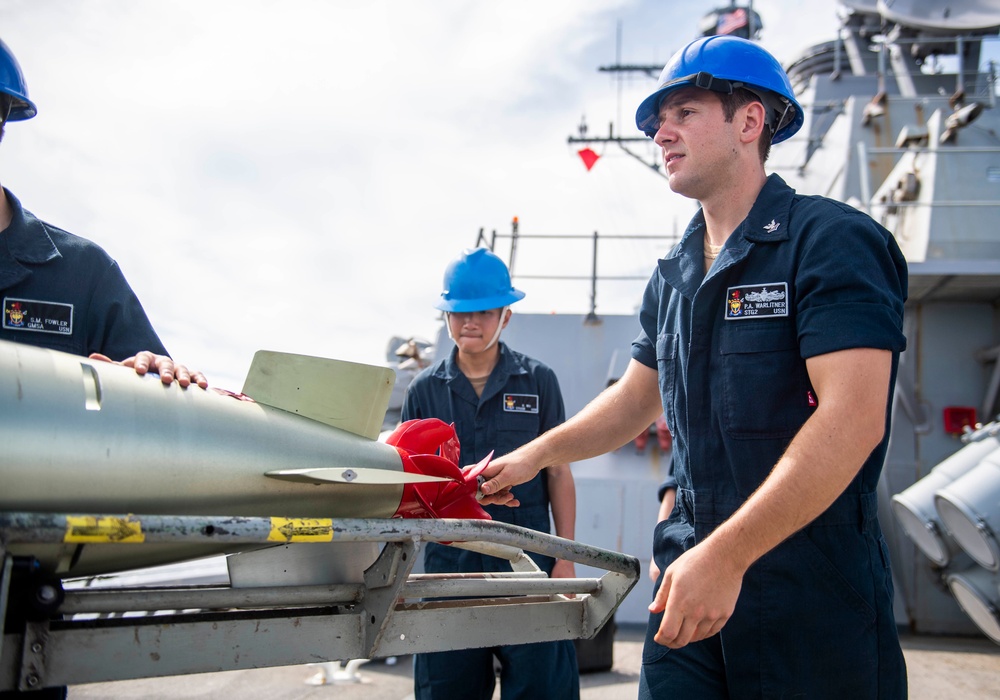 Sailors Aboard USS Milius (DDG 69) Load Mark 46 Torpedos into Mark 32 Surface Vessel Torpedo Tubes