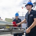 Sailors Aboard USS Milius (DDG 69) Load Mark 46 Torpedos into Mark 32 Surface Vessel Torpedo Tubes