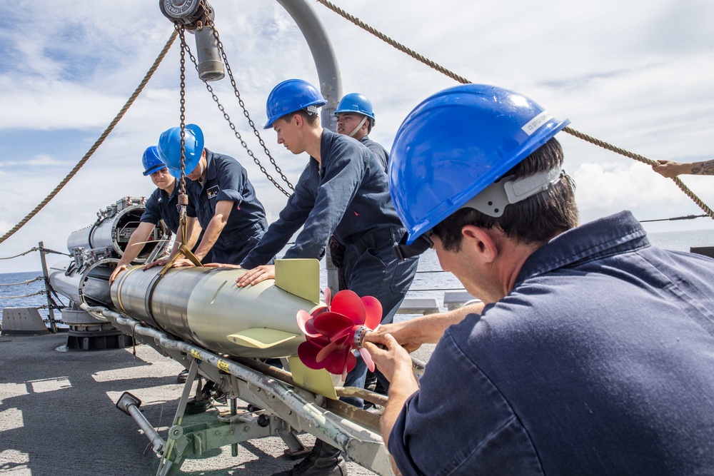 Sailors Aboard USS Milius (DDG 69) Load Mark 46 Torpedos into Mark 32 Surface Vessel Torpedo Tubes