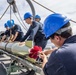 Sailors Aboard USS Milius (DDG 69) Load Mark 46 Torpedos into Mark 32 Surface Vessel Torpedo Tubes