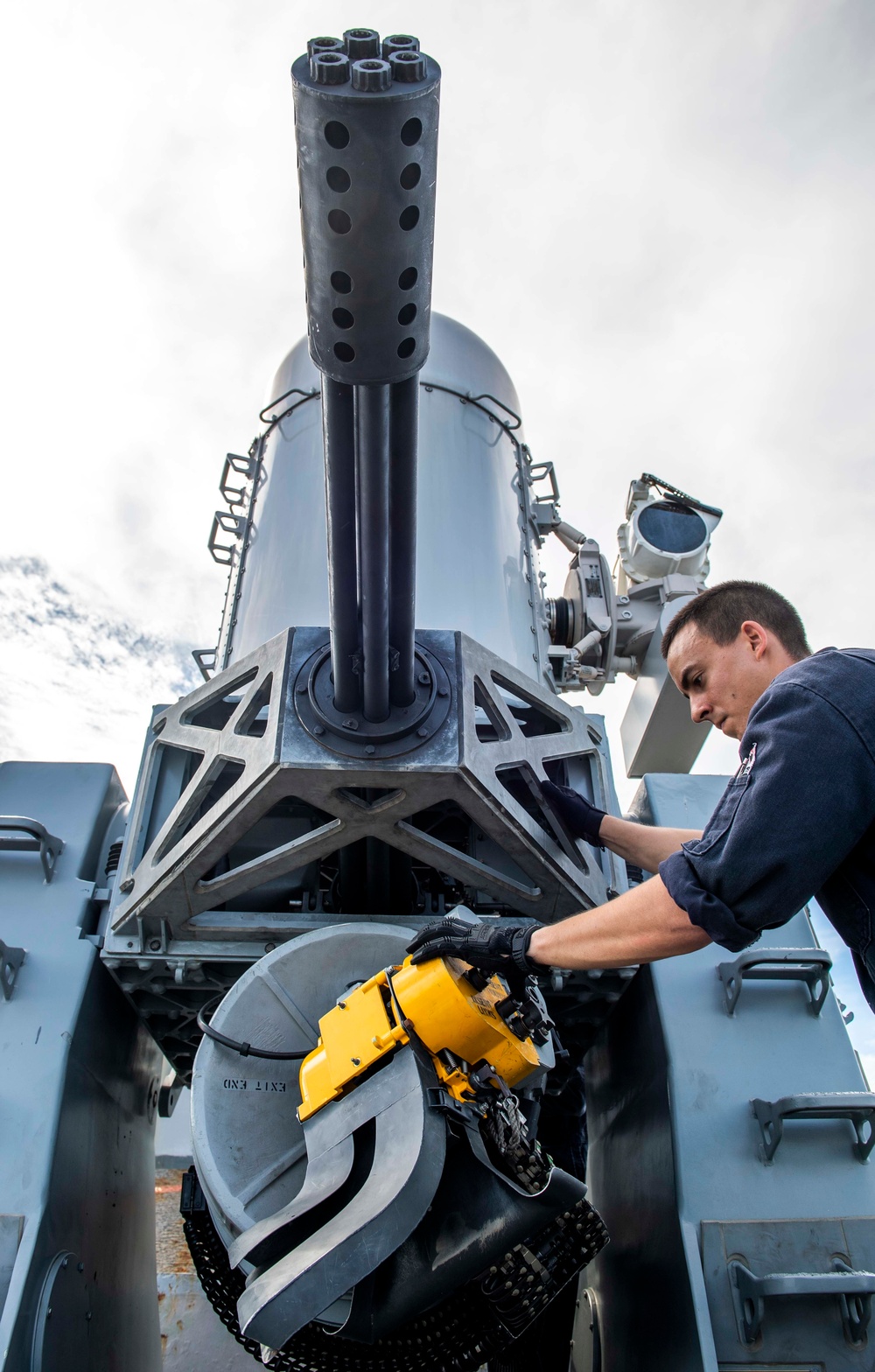 Sailors Aboard USS Milius (DDG 69) Load and Fire Close-In Weapons System