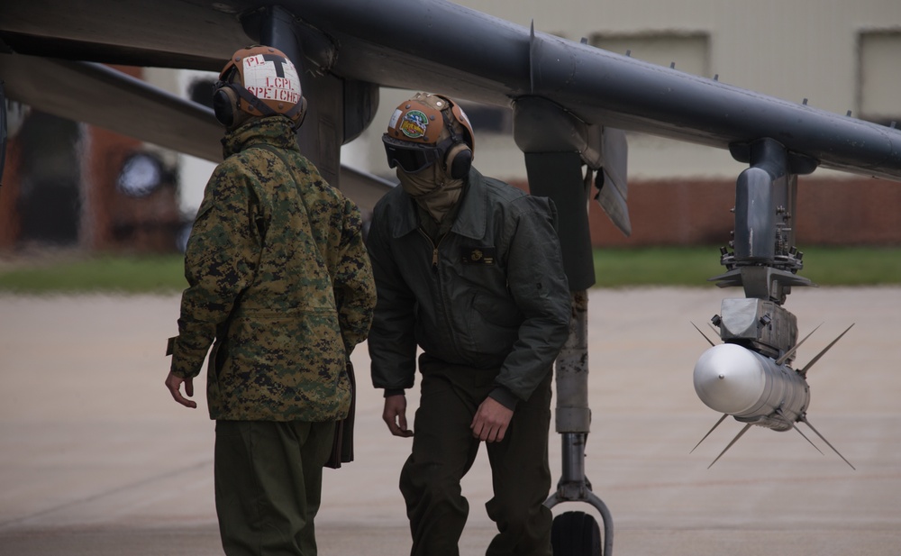 Marines perform pre-flight checks during Exercise Banzai Badlands