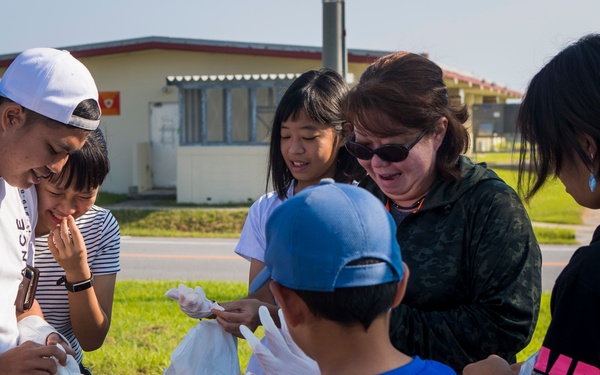 Members of the U.S. and local communities volunteer to keep Uruma City beautiful