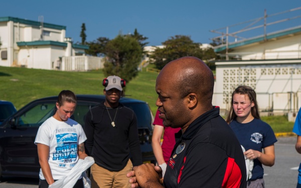 Members of the U.S. and local communities volunteer to keep Uruma City beautiful