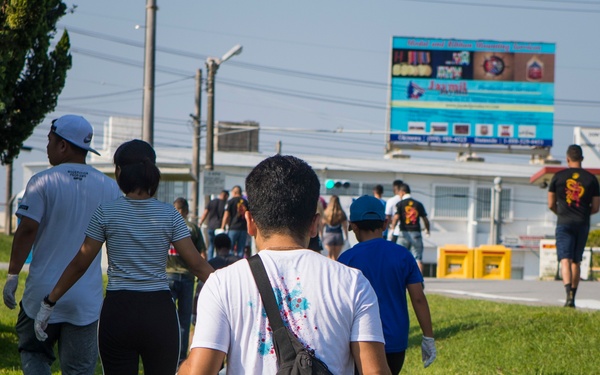 Members of the U.S. and local communities volunteer to keep Uruma City beautiful