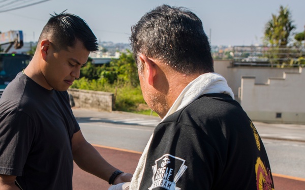 Members of the U.S. and local communities volunteer to keep Uruma City beautiful