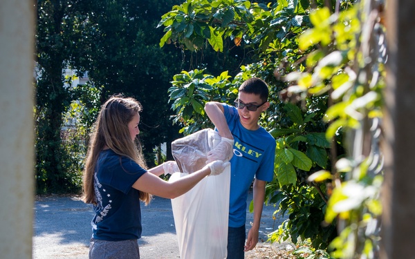 Members of the U.S. and local communities volunteer to keep Uruma City beautiful