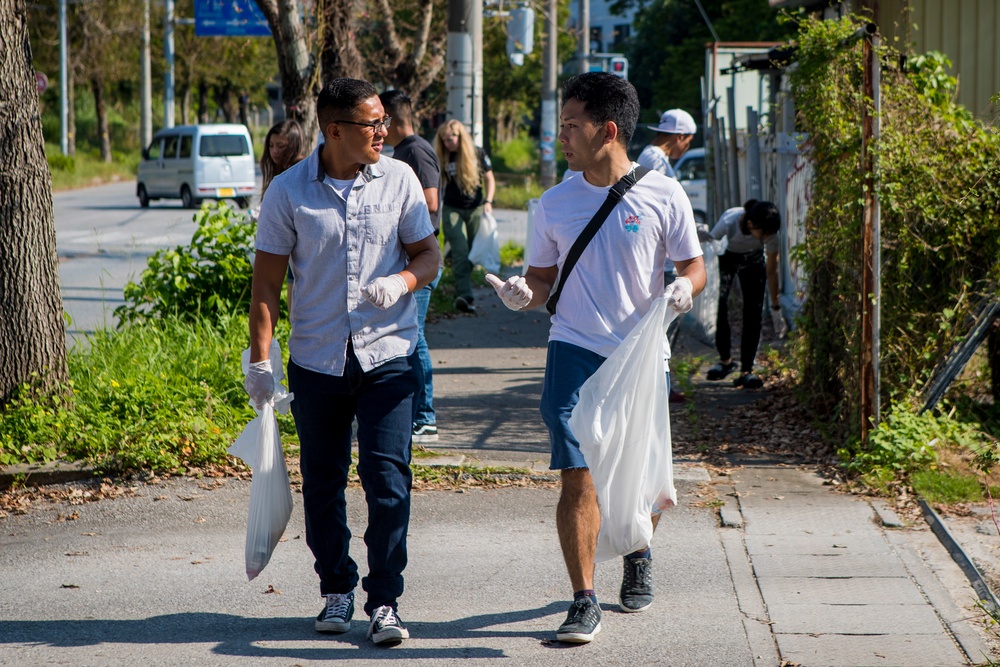 Members of the U.S. and local communities volunteer to keep Uruma City beautiful