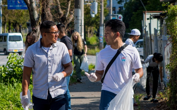 Members of the U.S. and local communities volunteer to keep Uruma City beautiful