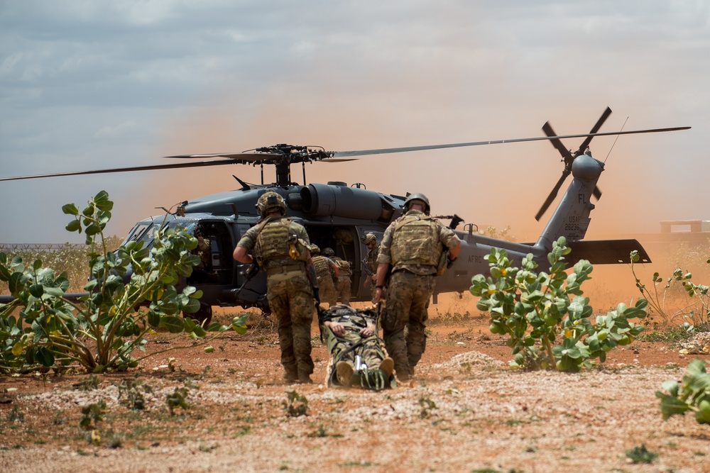 102nd Cavalry Regiment trains with the 303rd Expeditionary Rescue Squadron