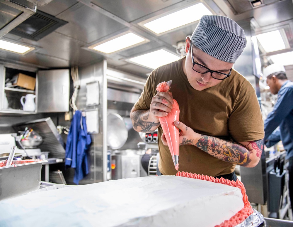 Sailors Aboard USS Milius (DDG 69) Prepare Food for the Crew