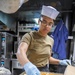 Sailors Aboard USS Milius (DDG 69) Prepare Food for the Crew