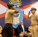 Chief Warrant Officer 2 Juan Castillo gives his first salute as an officer in the United States Navy