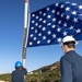 USS Normandy Sailor Hoists Union Jack