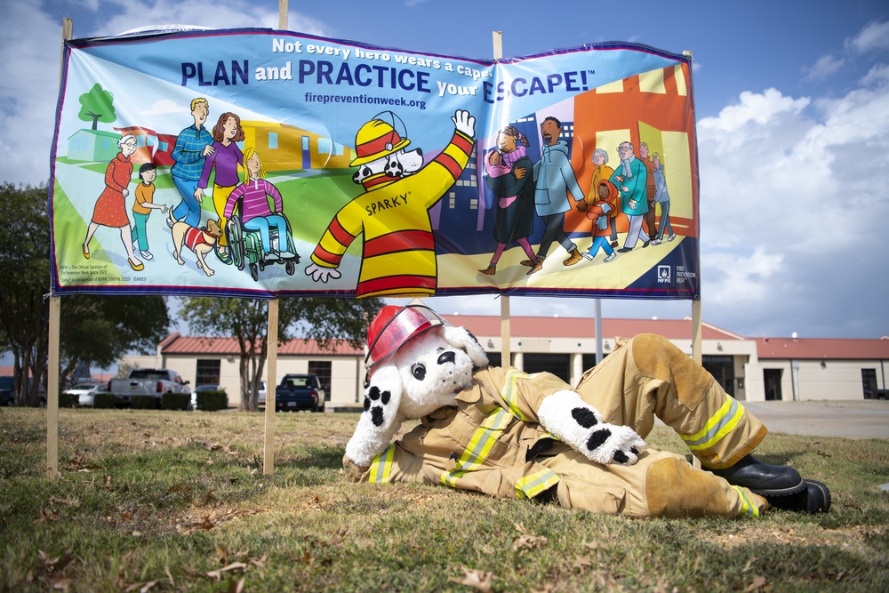 Sparky poses for Fire Prevention Week