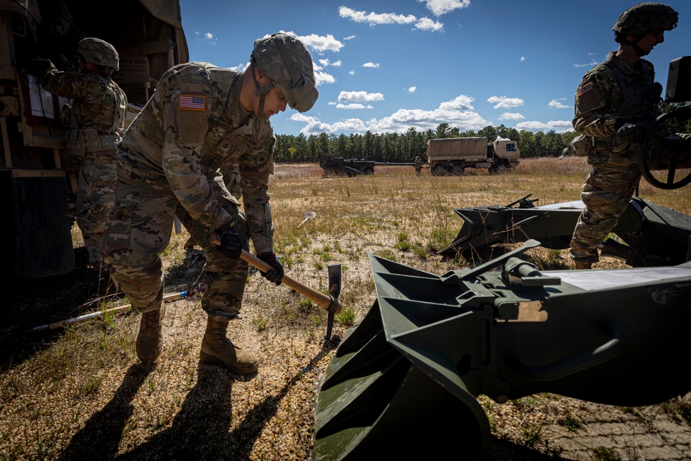Soldiers set up M777 howitzer