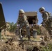 Soldiers set up M777 howitzer