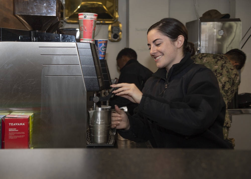 Retail Service Specialist Serves Coffee