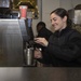 Retail Service Specialist Serves Coffee