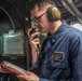 Sailors Work Aboard USS Harpers Ferry