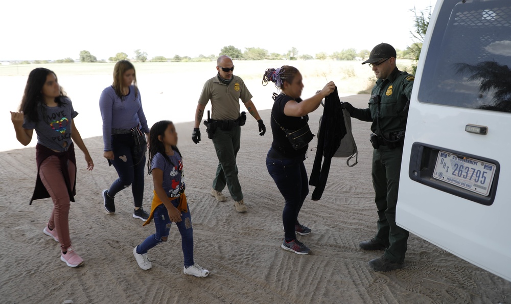 USBP agents rescue a migrant family in distress