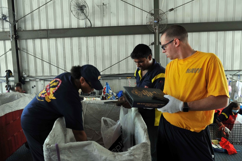 Emory S. Land Sailors Participate in a Community Outreach Event in Singapore