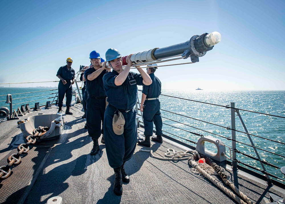 USS Gridley Sailors Stow Ship's Jack Staff