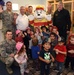 Reading with 100th Civil Engineer Squadron firefighters, Sparky the Fire Dog