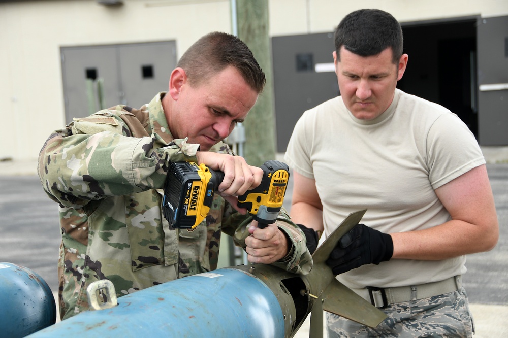 178 LRS munition systems specialists train on building bombs