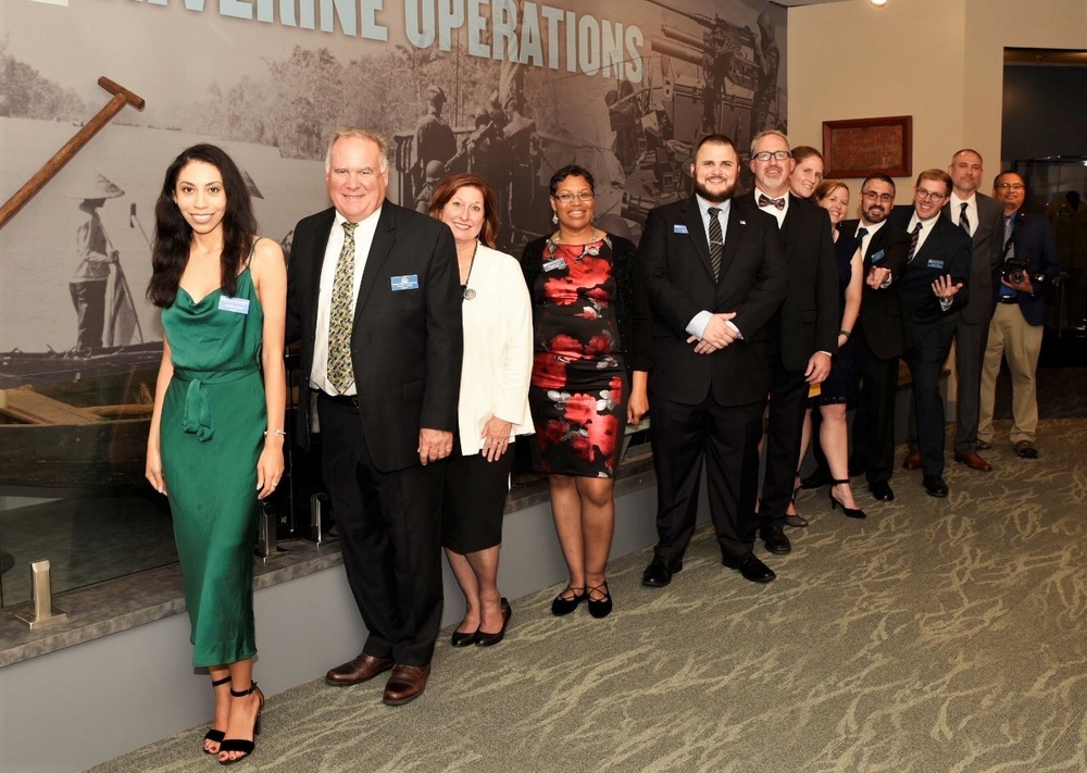 Museum staff members at new exhibit reception