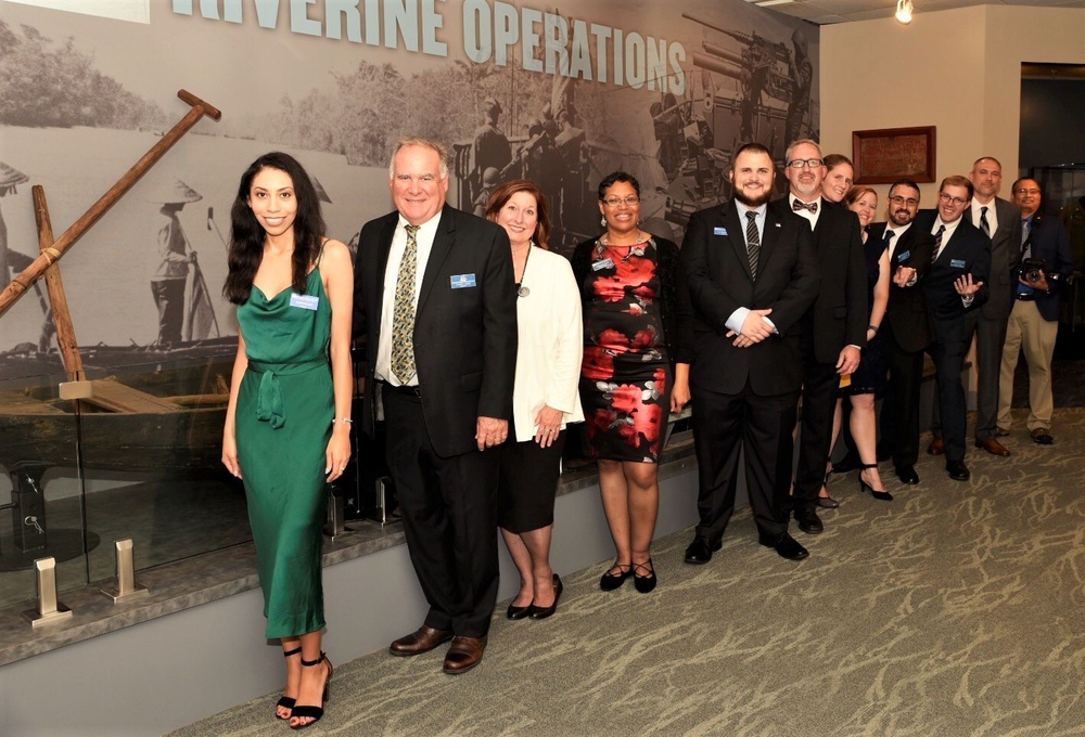 Museum staff at new exhibit reception