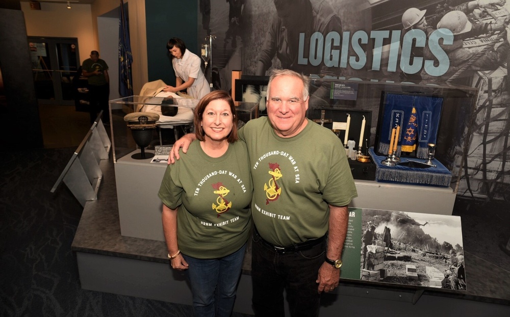 Museum staff members in new exhibit