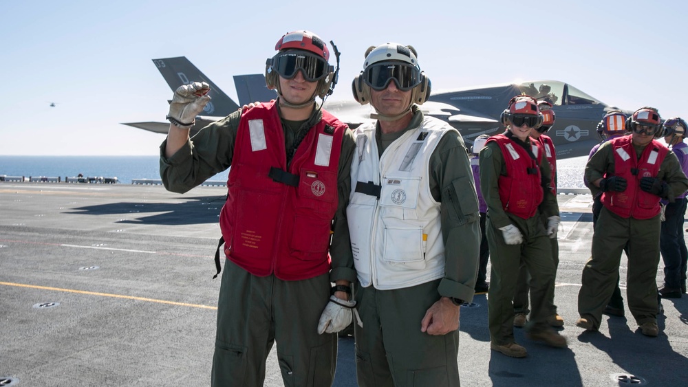 Illinois Native is reenlisted by the 3rd MAW CG