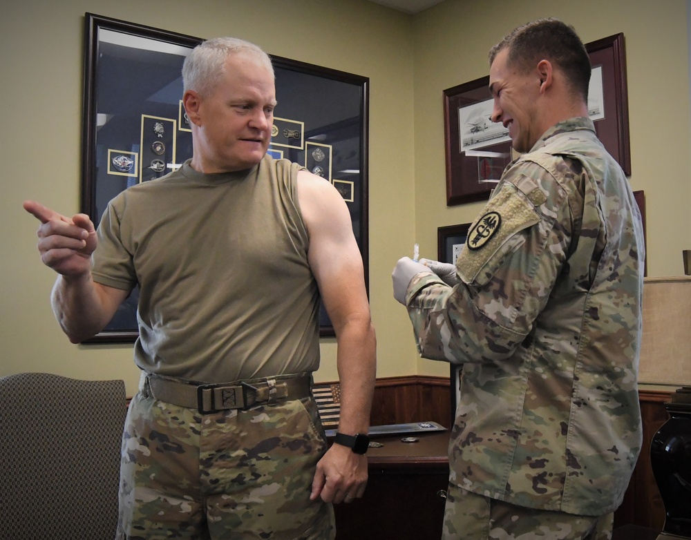 Fort Knox command team leads the way on flu season immunizations