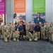 Sailors and Marine Volunteer At Marlin Food Bank