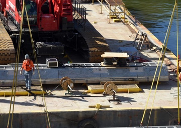 Sections of bio acoustic fish fence submerged at Barkley Lock