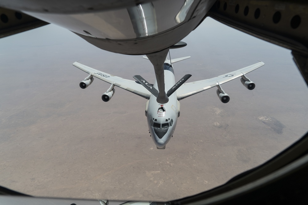 KC-135 Stratotanker refuels E-3 Sentry AWACS