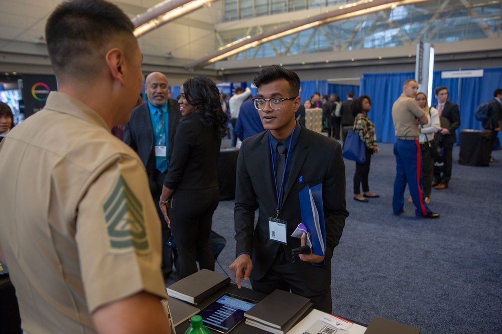 Marines host a career fair booth at the Society of Asian Scientists and Engineers National Conference