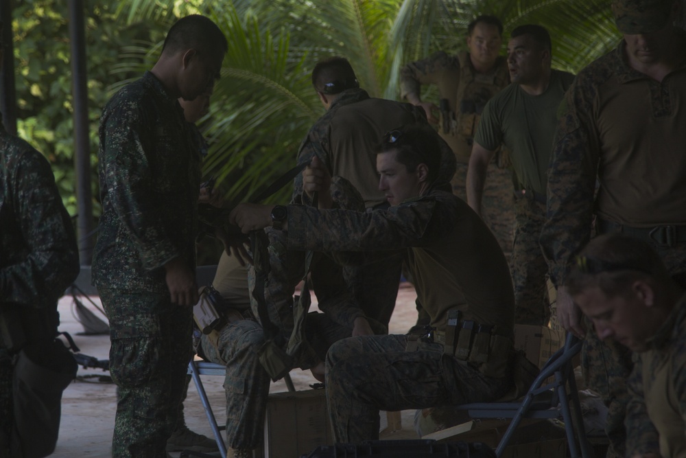 U.S. Marines and Philippine Marines shoot at the range during exercise KAMANDAG 3